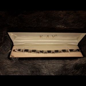 Mens stainless steel and black bracelet with extra link.